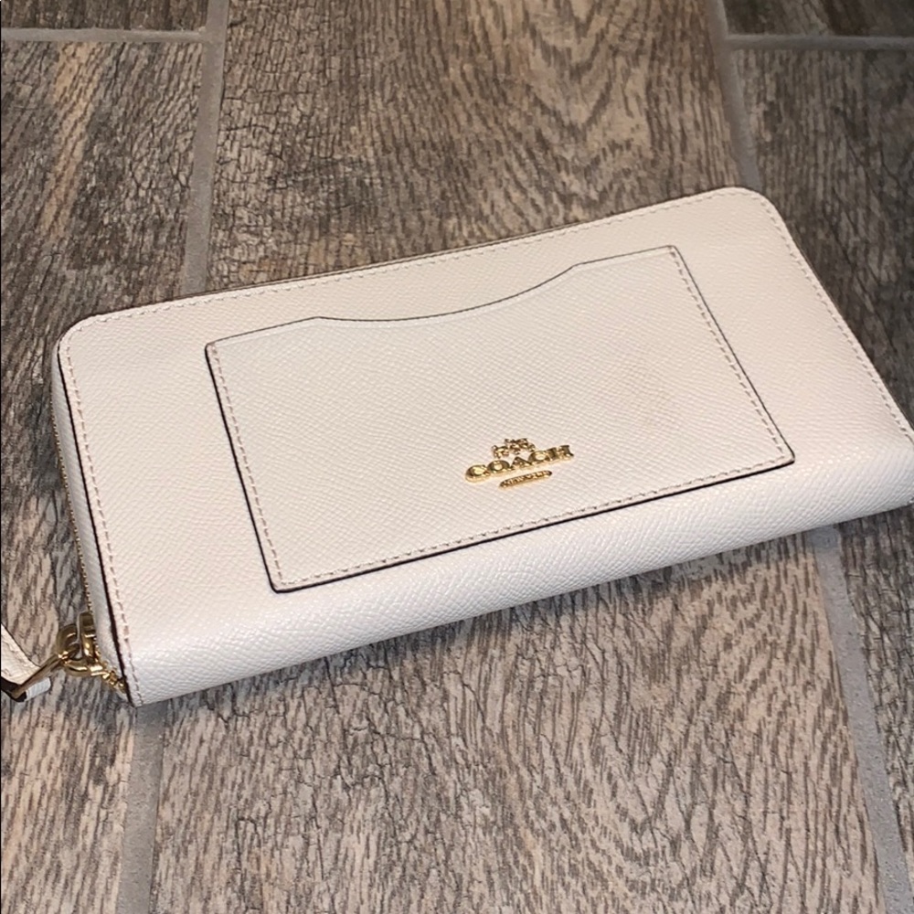 Coach clutch wallet cream colored.  Used once